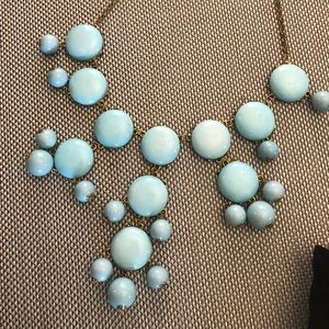 Sea foam color stones and gold tone chain